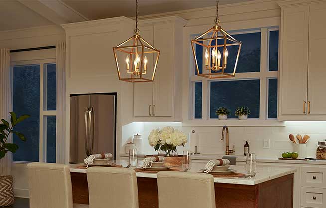 Kitchen illuminated by under cabinet lights.