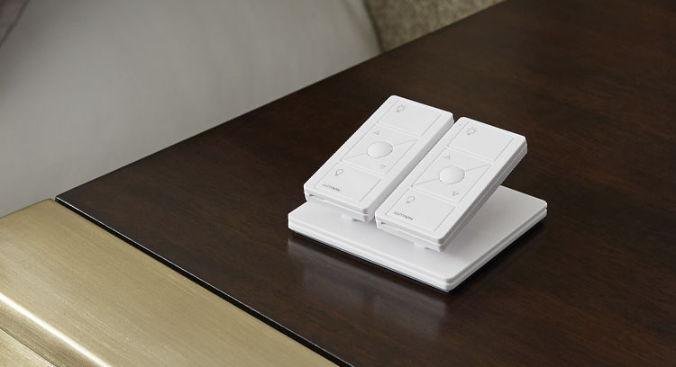 Pico pedestal remotes on bedside table.